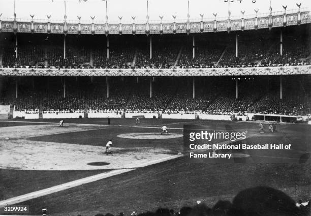 General view of the Polo Grounds during a 1912 World Series game between the New York Giants and the Boston Red Sox in Manhattan, New York. The Red...