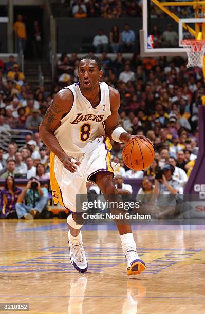 Kobe Bryant of the Los Angeles Lakers drives during the game against the Utah Jazz at Staples Center on March 28, 2004 in Los Angeles, California....