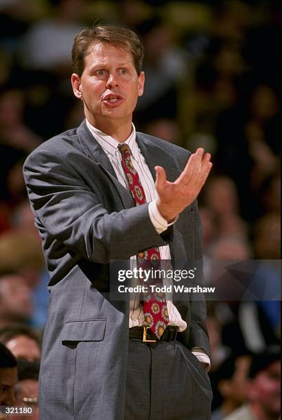 Head coach Danny Ainge of the Phoenix Suns gestures from the sidelines during a game against the Los Angeles Lakers at the Great Western Forum in...