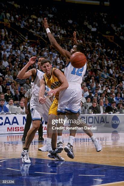 Guard Bryce Drew of the Valparaiso Crusaders in action against guard Cuttino Mobley of the Rhode Island Rams during an NCAA Tournament game at the...