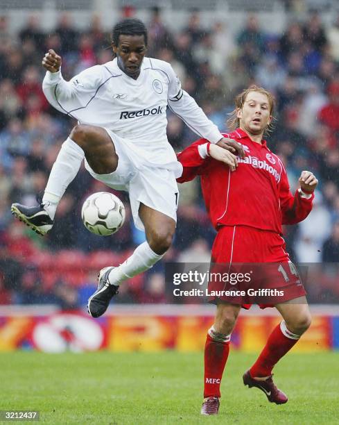 Jay Jay Okocha of Bolton battles with Gaizka Mendieta of Boro during the FA Barclaycard Premiership match between Middlesbrough and Bolton Wanderers...