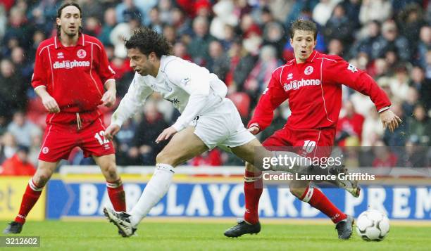 Ivan Campo of Bolton battles with Juninho of Boro during the FA Barclaycard Premiership match between Middlesbrough and Bolton Wanderers at The...