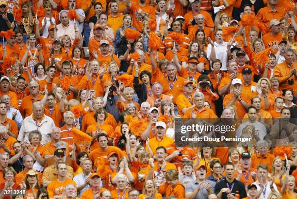 The Oklahoma State Cowboys fans cheer their team on against the Georgia Tech Yellow Jackets during the semifinal game of the NCAA Final Four...