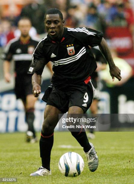 Freddy Adu of DC United works his way upfield against the San Jose Earthquakes during the second half at RFK Stadium April 3, 2004 in Washington, DC....