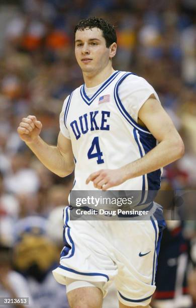 Redick of the Duke Blue Devils celebrates after scoring against the UConn Huskies during the semifinal game of the NCAA Final Four Tournament at the...