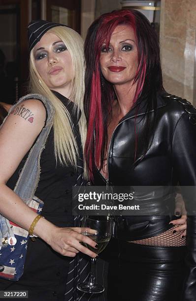 Gary Newman's wife with her freind at the 9th Kerrang! Awards held at the Park Lane Hilton Hotel on 27th August 2002 in London.