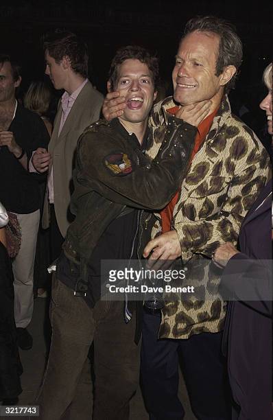 Chris Jagger and his son attend the Ozzie Clark Retrospective at The Victoria and Albert Museum on July 15, 2003 in London.