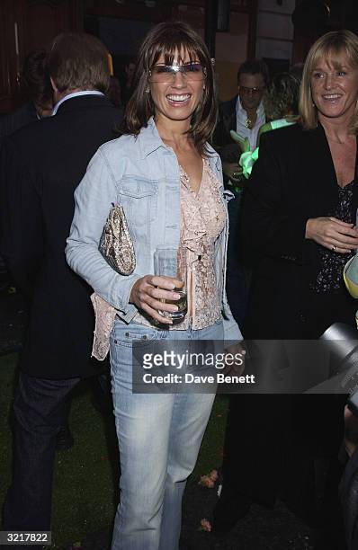 Stacey Young, wife of singer Paul Young, during the street party and collection preview in Saville Row on 12th February 2002 to mark the new couture...