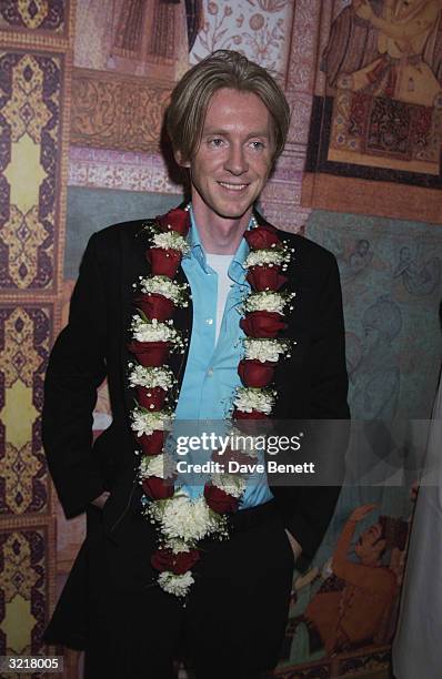Milliner, Phillip Treacey at Selfridges Department Store on 2nd May 2002. A huge effort had been made to create an Indian atmosphere reflecting a...