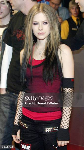 Musician Avril Lavigne arrives for the JUNO Awards ceremony at the Rexall Centre April 4, 2004 in Edmonton, Alberta, Canada.