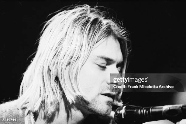 American singer and guitarist Kurt Cobain , performs with his group Nirvana at a taping of the television program 'MTV Unplugged,' New York, New...