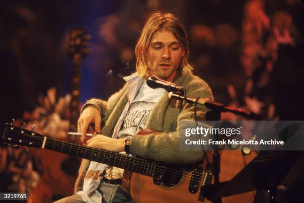 American singer and guitarist Kurt Cobain , performs with his group Nirvana at a taping of the television program 'MTV Unplugged,' New York, New...