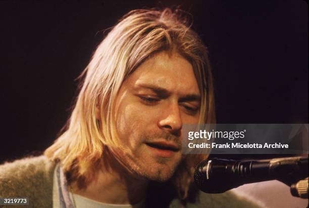 American singer and guitarist Kurt Cobain , performs with his group Nirvana at a taping of the television program 'MTV Unplugged,' New York, New...