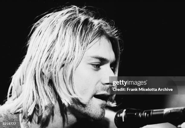 American singer and guitarist Kurt Cobain , performs with his group Nirvana at a taping of the television program 'MTV Unplugged,' New York, New...