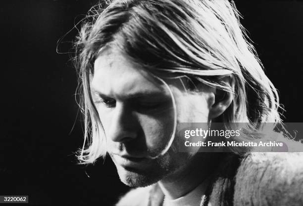 American singer and guitarist Kurt Cobain , performs with his group Nirvana at a taping of the television program 'MTV Unplugged,' New York, New...