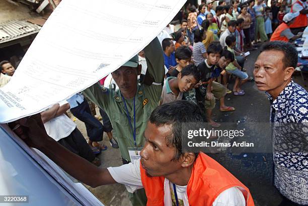 Election officials tally poll results April 5, 2004 in Jakarta, Indonesia. Around 147 million eligible voters in the world's most populous Muslim...