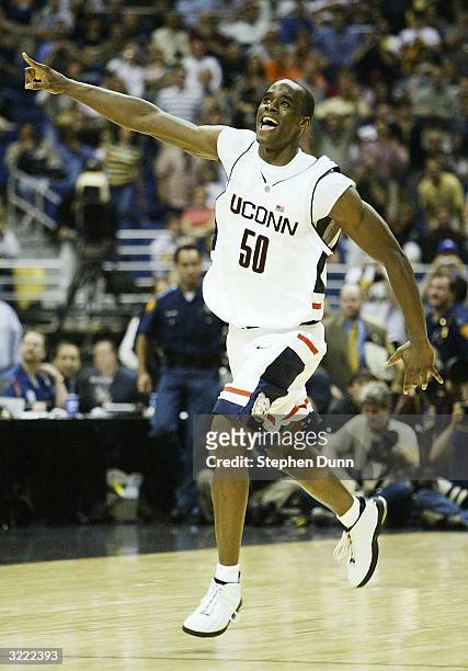 Emeka Okafor of the UConn Huskies celebrates after defeating the Georgia Tech Yellow Jackets 82-73 during the National Championship game of the NCAA...