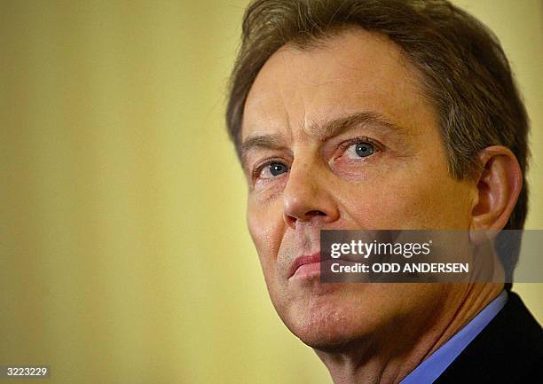 British Prime minister Tony Blair listens to a question during a joint press conference with Iraq's interim foreign minister Hoshyar Zebari at No.10...
