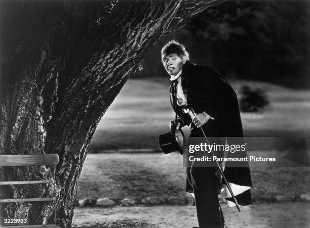 American actor Fredric March as Mr. Hyde standing in a park, in a still from director Rouben Mamoulian's film, 'Dr. Jekyll and Mr. Hyde'. March...