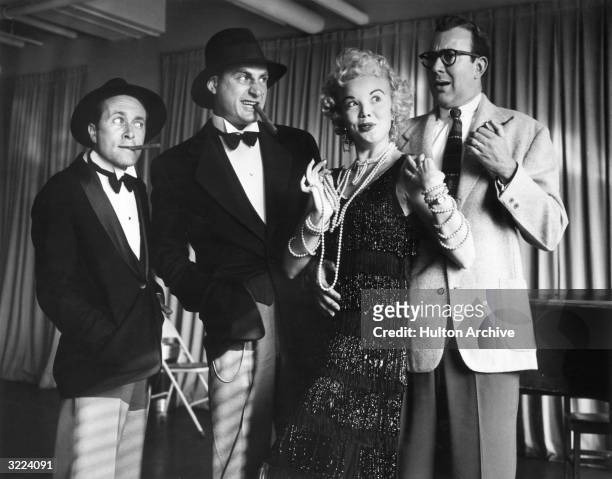 American actors Howard Morris, Sid Caesar, Nanette Fabray and Carl Reiner posing in costume during a rehearsal for the television series, 'Caesar's...