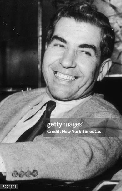 Headshot of Italian-born gangster Salvatore 'Lucky' Luciano smiling at the Hotel Excelsior, Rome, Italy.