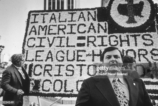 Italian-American activist Anthony Colombo, Vice-President of the Italian-American Civil RIghts League, with a floral tribute placed at the Columbus...