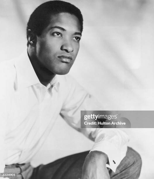 Promotional studio portrait of American soul singer Sam Cooke , looking up.