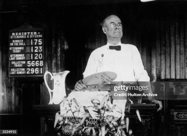 Political leader and orator William Jennings Bryan , an anti-evolutionist, preaches from the pulpit at the Little Methodist Church during the Scopes...