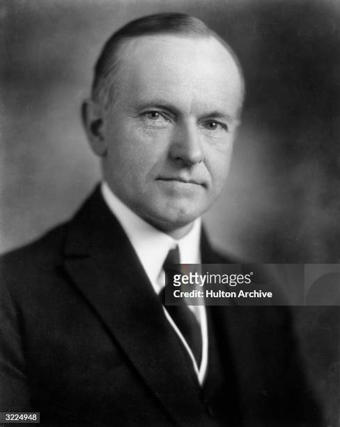 Studio portrait of America's thirtieth president Calvin Coolidge .