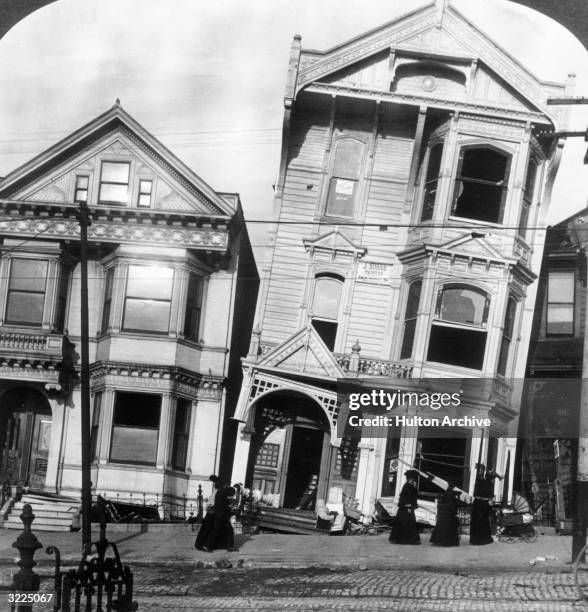 Damaged houses on Howard Street near 17th Street, after the San Francisco earthquake of April 18th 1906.