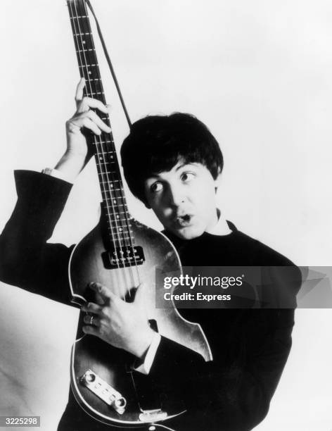 Paul McCartney of The Beatles with his Hohner bass.