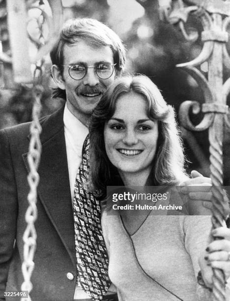 Portrait of engaged American couple Steven Weed and heiress Patty Hearst . The photo was taken prior to Hearst's kidnapping by the Symbionese...