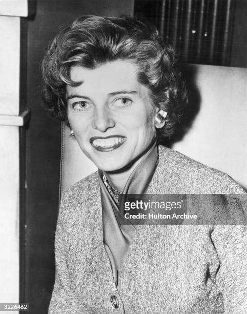 Headshot of Eunice Shriver, sister of John F Kennedy, smiling.