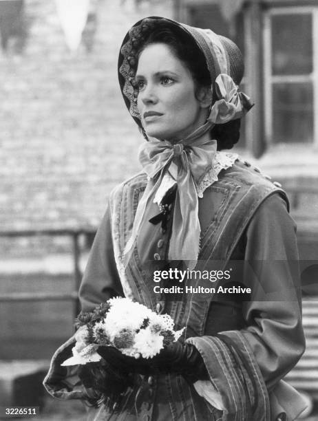 American actor Jaclyn Smith as the title character in a still from the made-for-TV movie 'Florence Nightingale'. Smith is wearing a period costume...