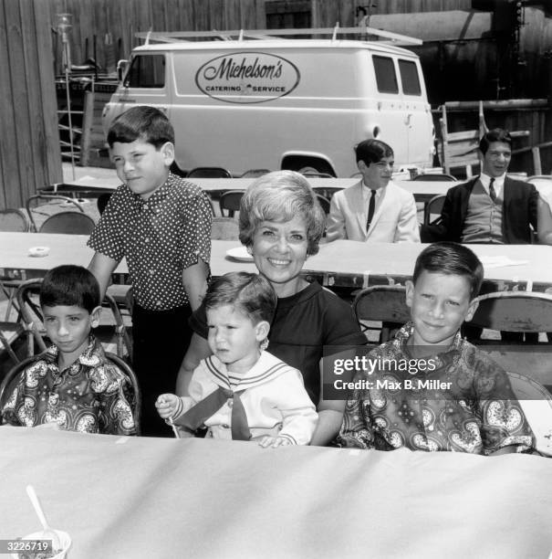 Patti Palmer, wife of comedian Jerry Lewis with their children Anthony, Chris, Joseph, and Scotty at a children's party, a 'Batman' luncheon for an...