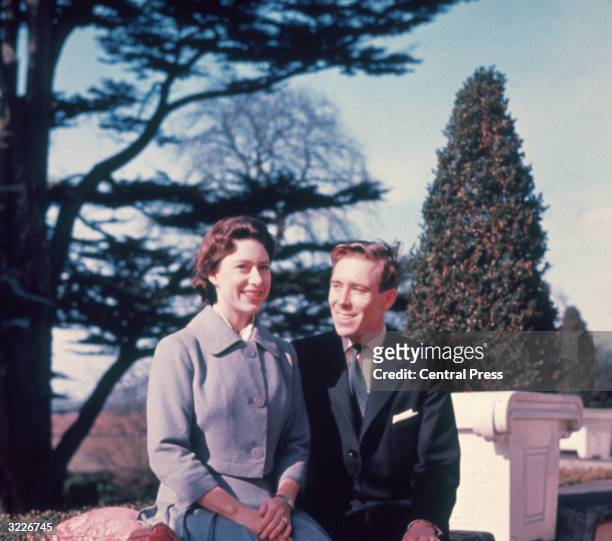 Princess Margaret and Antony Armstrong-Jones in the grounds of Royal Lodge after they announced their engagement.