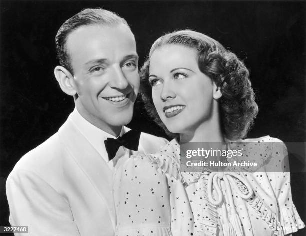 American actors and dancers Fred Astaire and Eleanor Powell smile while embracing in a promotional portrait for director Norman Taurog's film,...