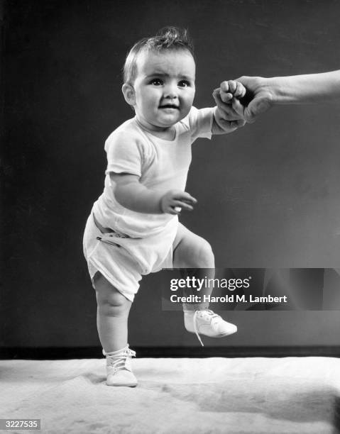 Baby Yes Hand Rise 431 Baby Raising Hand Stock Photos, High-Res Pictures, and Images ...
