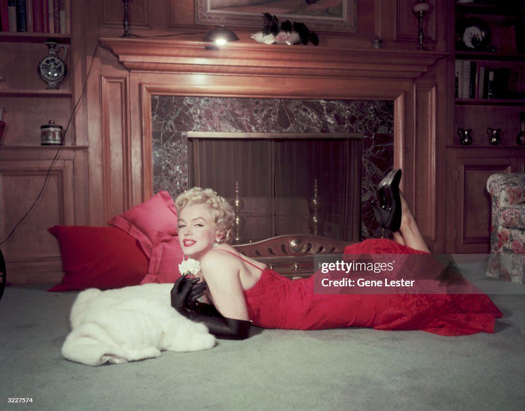 Marilyn Monroe In Front Of Fireplace