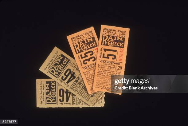 Still-life of two pairs of ticket stubs for the New York Giants and the New York Yankees baseball games. Each ticket cost $1.20.