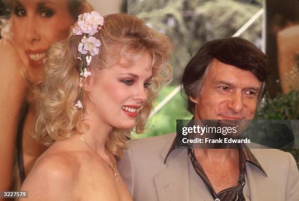 'Playboy' magazine founder and publisher Hugh Hefner with 1980 Playboy Playmate of the Year, Canadian model and actor Dorothy Stratten. Stratten...