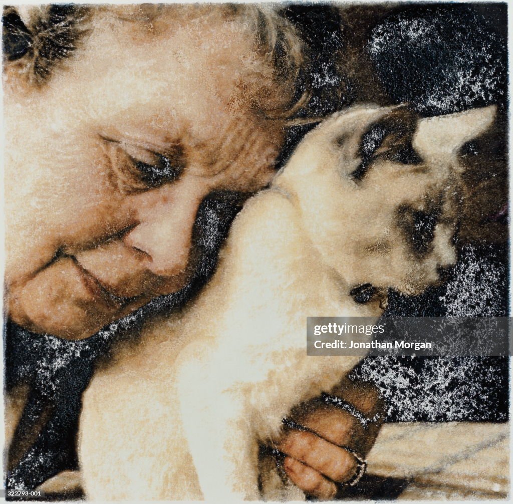 Elderly woman relaxing with cat, image transfer print