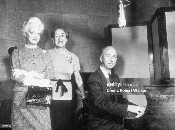From left to right Mrs Oscar Hammerstein, lyricist Dorothy Fields, and composer Alfred Simon prepare for a special radio tribute for American...