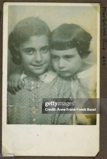 Portrait of Margot and Anne Frank . This picture was taken from Margot's photo album, Frankfurt, Germany.