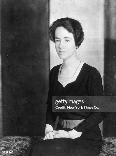 Portrait of Anne Morrow Lindbergh , wife of American aviator Charles Lindbergh, sitting with her hands in her lap.