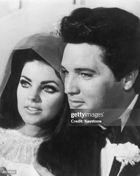 American rock n' roll singer and actor Elvis Presley with his bride Priscilla Beaulieu after their wedding in Las Vegas.