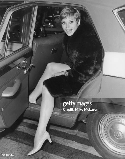 Juliet Prowse, star of the musical 'Sweet Charity' arriving in London for rehearsals.