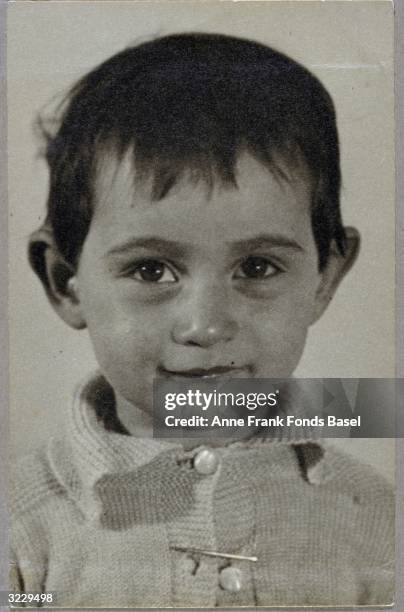 Headshot of Anne Frank as a young child, Frankfurt am Main, Germany. From Anne Frank's photo album.