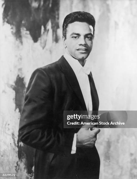 Tony Mathis Singer Studio portrait of American singer Johnny Mathis wearing white tie ...