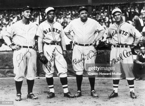 Full-length group portrait of American baseball players Lou Gehrig of the NY Yankees, Bill Terry of the NY Giants, Babe Ruth of the NY Yankees and...